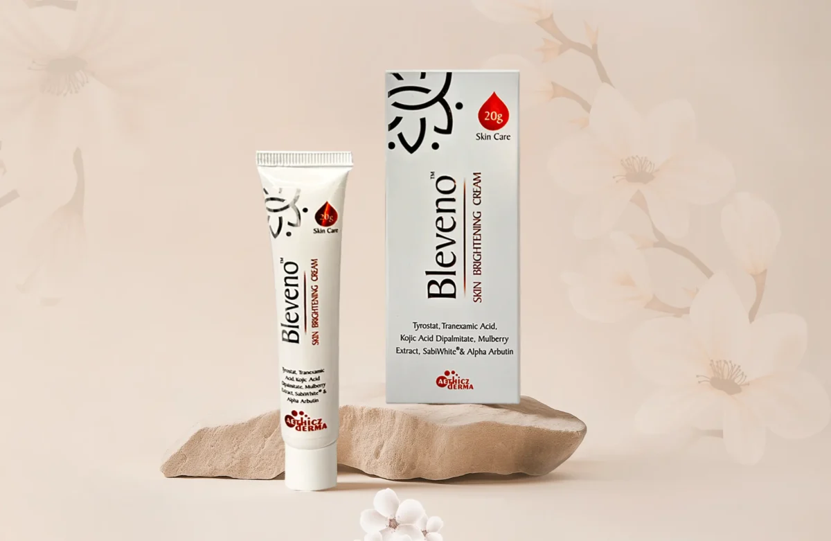 A tube of Blevano Skin Brightening Cream alongside its box, featuring ingredients like Tranexamic Acid and Kojic Acid.