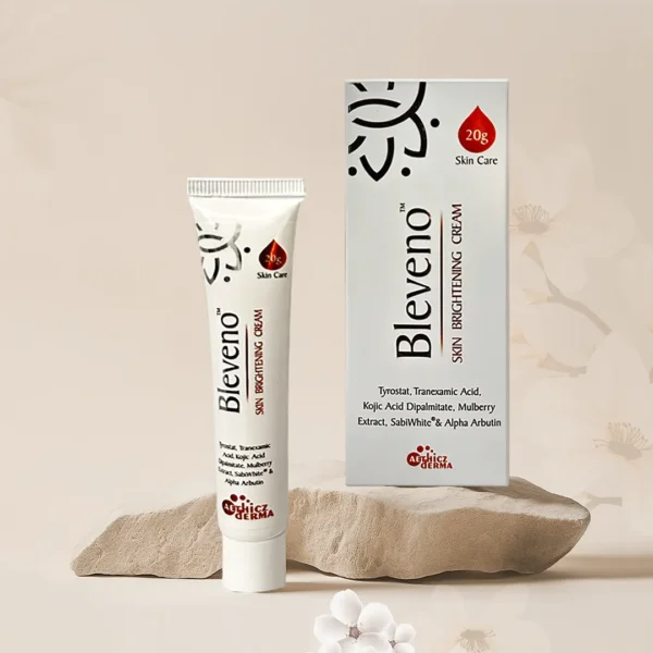 A tube of Blevano Skin Brightening Cream alongside its box, featuring ingredients like Tranexamic Acid and Kojic Acid.